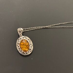 Elegant Silver and Amber Pendant Necklace